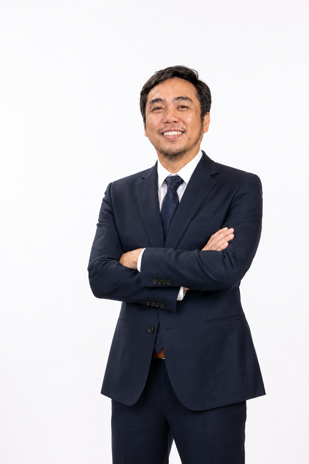 Jay-Ar Garcia, Founder & President of RemNeXus, wearing a navy suit